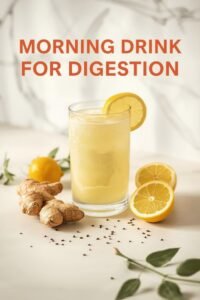 A tall glass of warm lemon water with a lemon slice garnish, serving as the best morning drink for gut health and digestion.